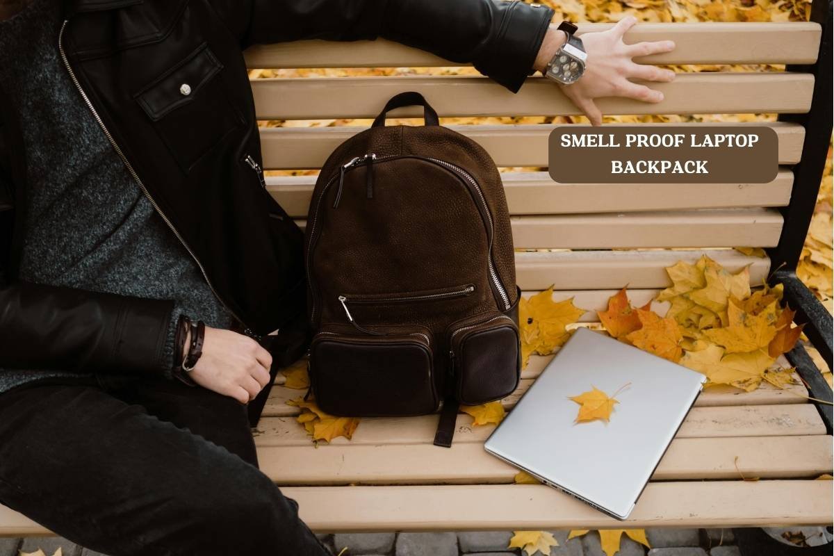 Smell proof laptop backpack on a park bench with autumn leaves, ideal for travel and odor control