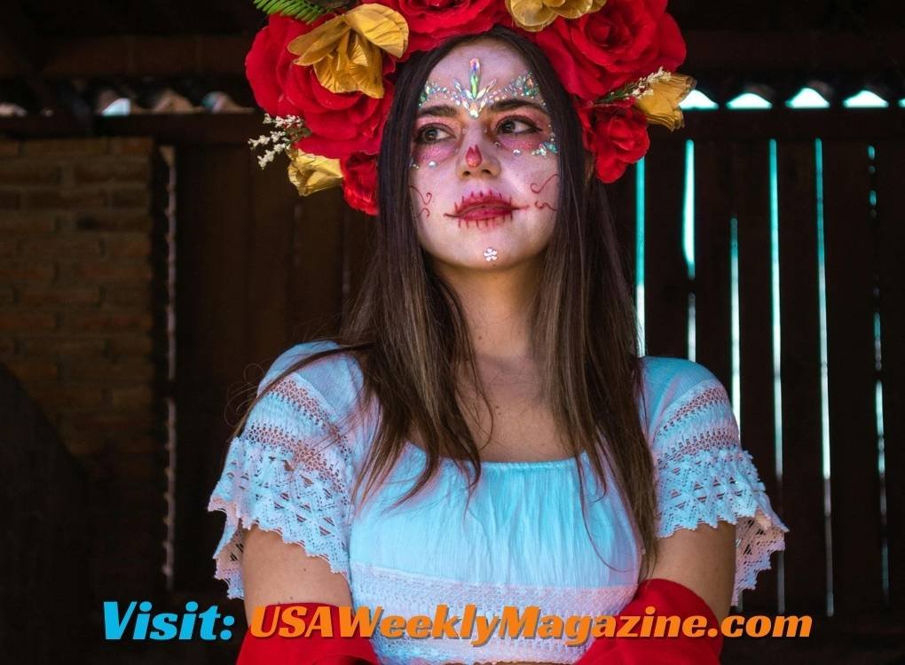 Woman with face paint and floral headpiece at the annual Austin festival for short nyt celebrations.